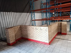 Demolish wall. Break down wall. Remove wall. Clear the space. Demolition. Ruble