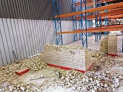 Demolish wall. Break down wall. Remove wall. Clear the space. Demolition. Ruble